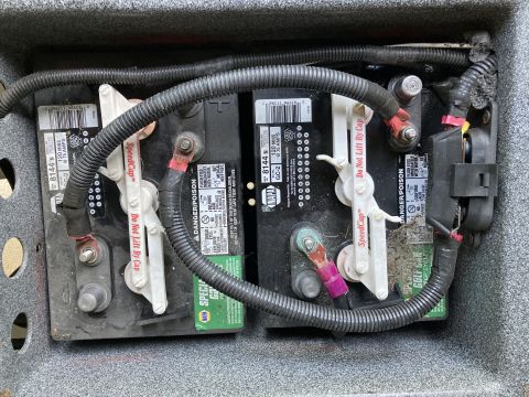 2015 Ford F-550 - Two NAPA 8144 N GC-2 batteries are shown in a gray battery box, connected by black cables and a black protective conduit.