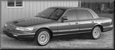 1995 Mercury Grand Marquis - A 1995 Mercury Grand Marquis sedan is shown from the front three-quarter angle.