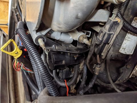1973 Ford Bronco - The EGR solenoid was too high (surprise, surprise... do a body lift first!) so we took the mounting bracket and flipped it 180 which moved…