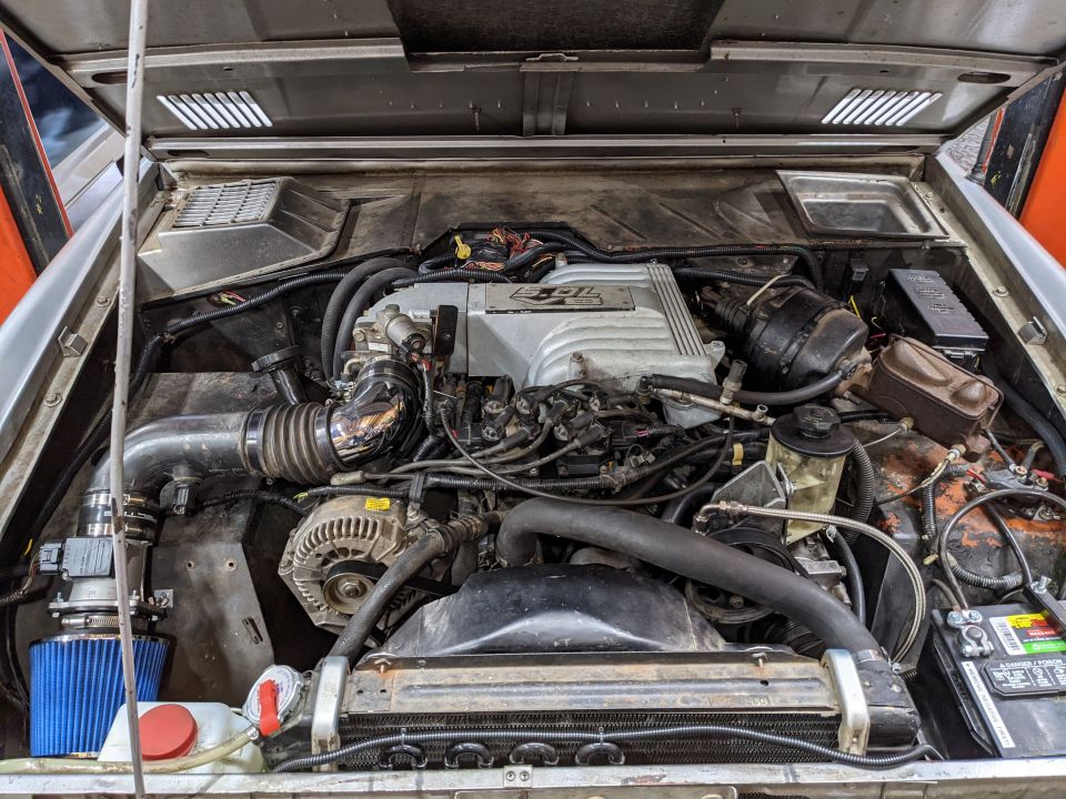 Nearly finished.  We were going to keep the A/C lines for potential future use but we're going to yank them since they clutter things up.  A little more wire management and it'll look pretty nice!