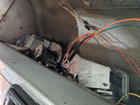 1973 Ford Bronco - OBD2 port (AKA DLC) for diagnostics. It has 3 wires from C115 and then a power and ground wire. Laying on the floor are the check engine li…