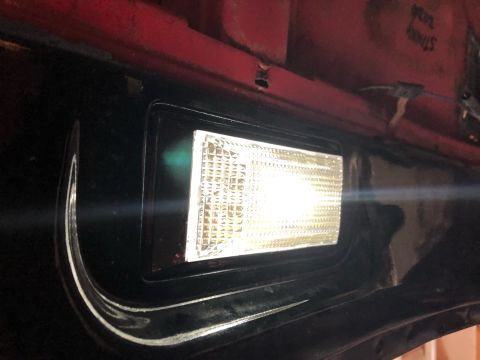 1978 Ford Bronco - Headlight assembly detail, likely from a vehicle part replacement.