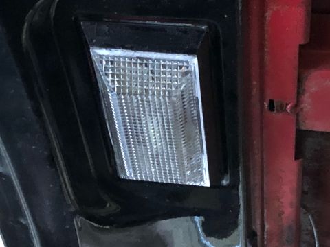 1978 Ford Bronco - This is a close-up of a vehicle's side marker light. The year and make are not identifiable from this part.