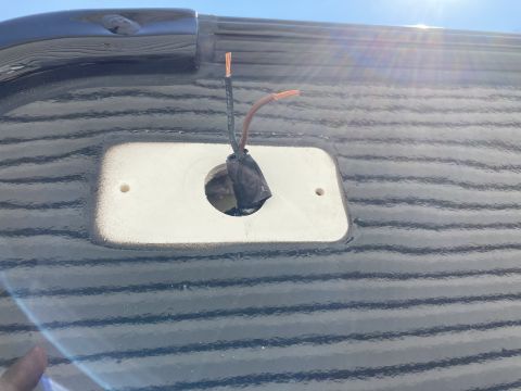 2015 Ford F-550 - Exposed electrical wires are visible emerging from a rectangular cutout on the exterior of a vehicle, likely for a light fixture. The cutou…
