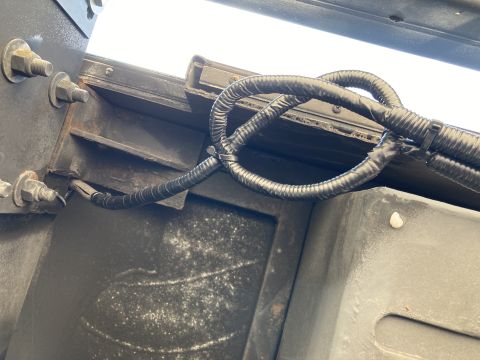 2015 Ford F-550 - Wiring harness detail on the underside of a vehicle.