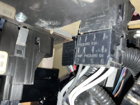 2015 Ford F-550 - A close-up view shows a black electrical relay labeled "PACKARD 630" and "AMP PACKARD 58" with several wires connected to it. The relay is…