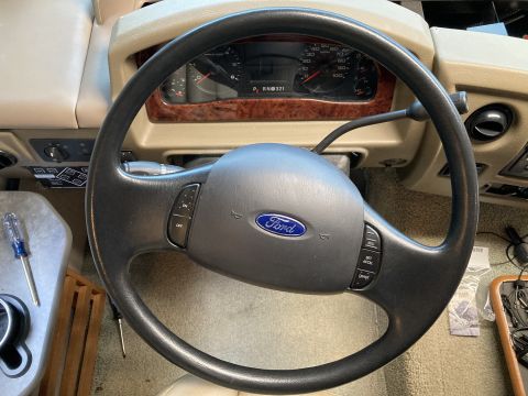 2015 Ford F-550 - Interior view of a Ford steering wheel and dashboard, showing gauges and controls.