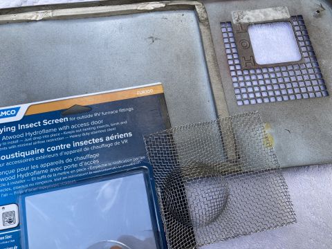 2015 Ford F-550 - A screen designed to prevent insects from entering an RV furnace fitting is shown with its packaging.