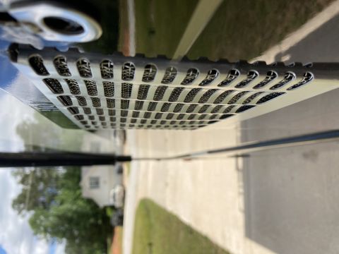 2015 Ford F-550 - A detailed view of a vehicle's bug screen, showing its intricate mesh pattern.