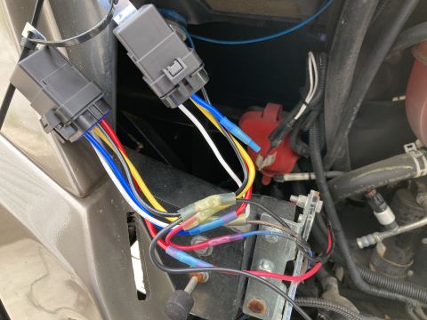 2015 Ford F-550 - Vehicle wiring harness and relays with multiple colored wires and connectors visible.