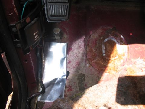 1989 Ford Bronco - pulled up the carpet by the high beam switch, and yup...big rust hole, enough to swallow the heel of my boot, aluminum bandaid is the only…