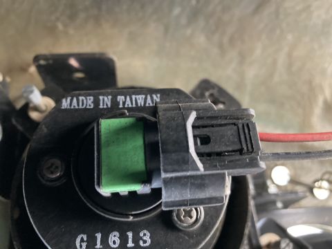 2015 Ford F-550 - Automotive part with 'MADE IN TAIWAN' and part number 'G1613' visible on the housing.