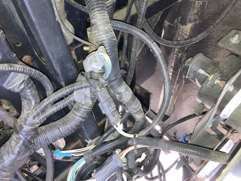 2015 Ford F-550 - A complex network of electrical wiring and connectors is visible in this close-up view.