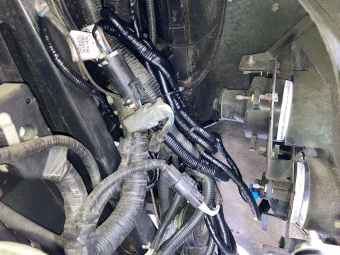 2015 Ford F-550 - This image shows a complex wiring harness and parts of a vehicle's lighting system.