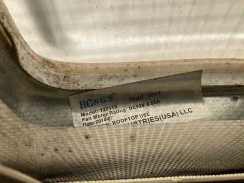 2015 Ford F-550 - Label on a roof vent indicates it is for rooftop use and manufactured by Industries (USA) LLC.