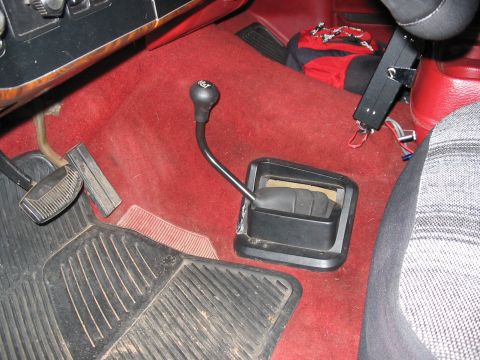 1989 Ford Bronco - you can just see the toggle switches just beyond the seat cushion next to the CB. truck looks stock!!