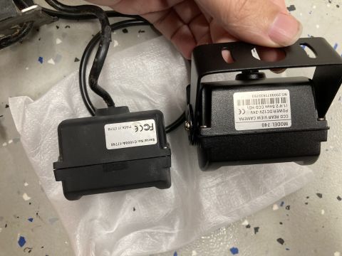 2015 Ford F-550 - Two rear-view cameras are shown, one with a label indicating "MODEL: 740 CCD REAR VIEW CAMERA" and the other with "Serial No: C10000A-17748…