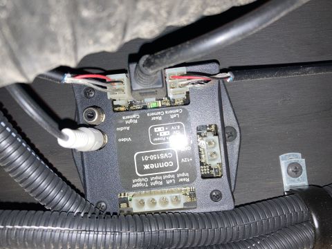2015 Ford F-550 - A Connext CVS150-01 module is mounted with screws, featuring connectors for camera, audio, and video inputs, along with power and trigger i…