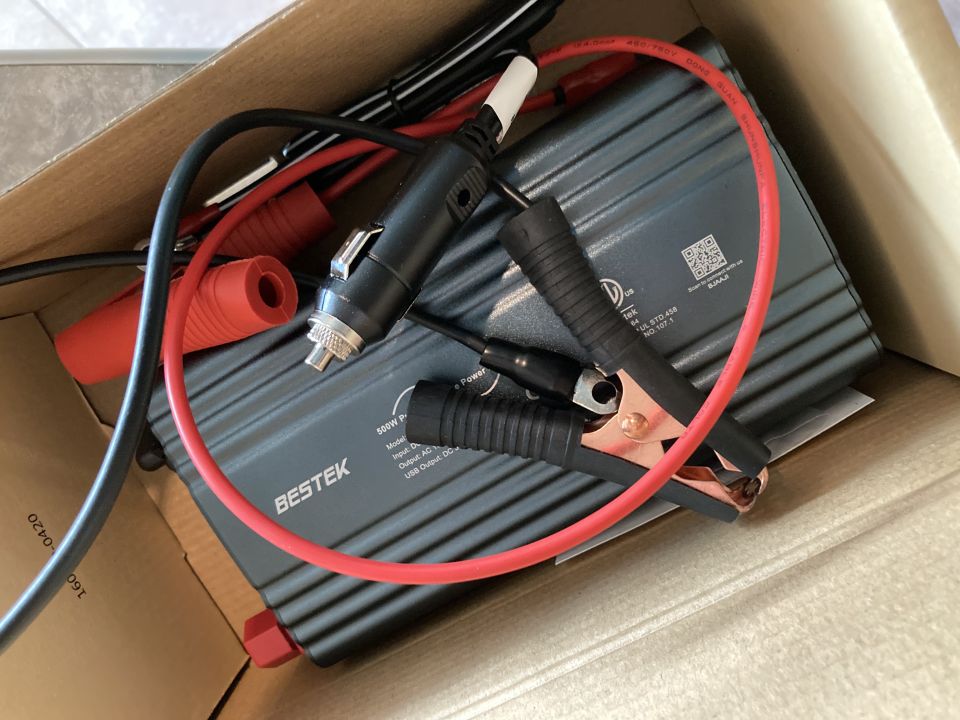 BESTEK power inverter with cables and connectors in a box