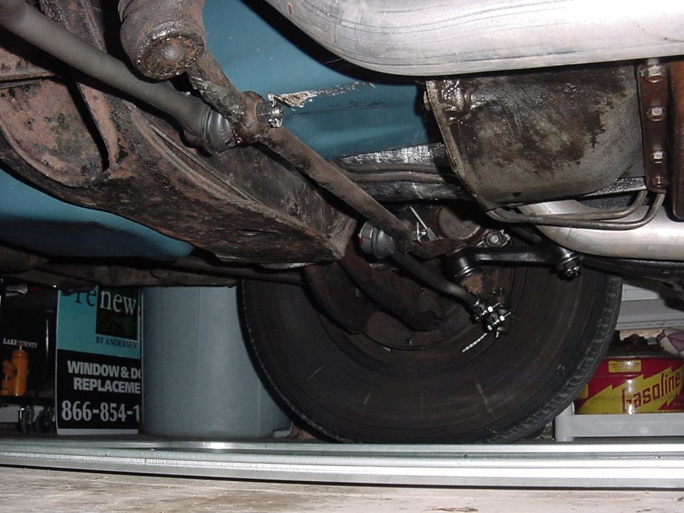 Looking toward passenger front tire, showing some of the new idler arm.