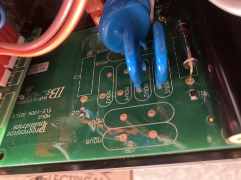 2015 Ford F-550 - Close-up view of the internal components of a Progressive EMS-HW30C surge protector.