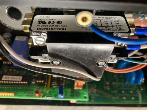 2015 Ford F-550 - Internal components of an electrical device, including a relay and circuit board, are visible.