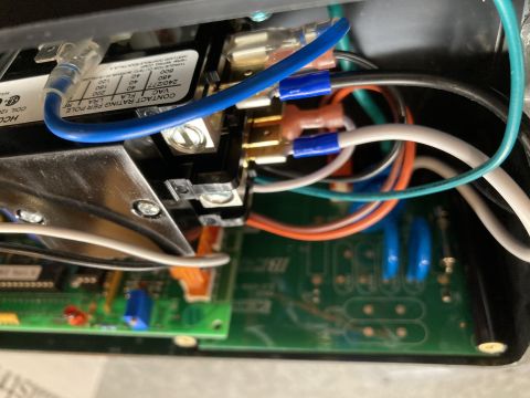2015 Ford F-550 - Internal view of electrical components, including a relay and circuit board, with visible wiring and connectors.
