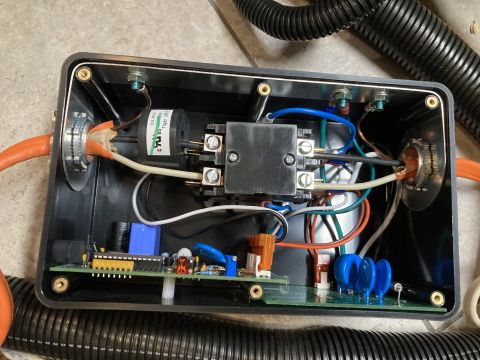 2015 Ford F-550 - Internal components of an RV surge protector, including a circuit board and wiring.