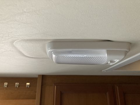 2015 Ford F-550 - A close-up view of an interior ceiling light fixture, likely from a recreational vehicle or van.