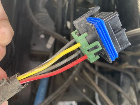 2015 Ford F-550 - A wiring harness connector with multiple wires is shown, likely for a vehicle component.