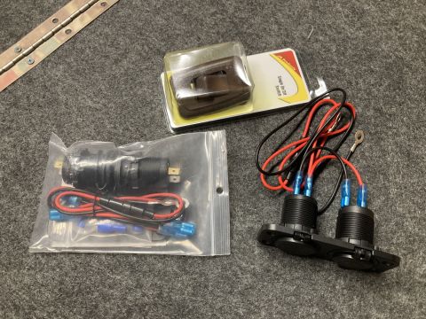 2015 Ford F-550 - Two vehicle power outlets and a switch are shown with their wiring harnesses, along with a separate power outlet kit.