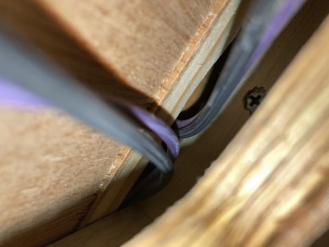 2015 Ford F-550 - Wires are visible within a wooden structure, suggesting an interior component or modification.