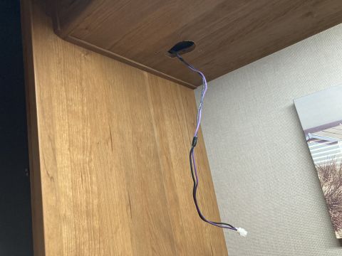 2015 Ford F-550 - Exposed wiring hangs from a ceiling opening, suggesting an unfinished or modified interior.