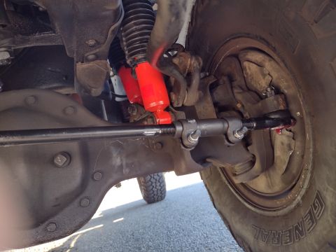 1994 Ford Bronco - Close-up of the front suspension and steering components of a 1994 Ford Bronco.