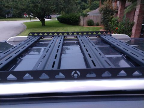 2018 Toyota 4Runner - Artec roof rack installed on a vehicle's roof, with a residential background.