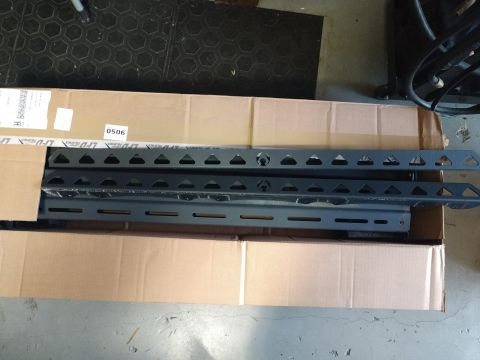 2018 Toyota 4Runner - Unpacked roof rack components are shown inside their shipping box, ready for installation.