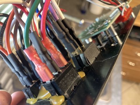 2015 Ford F-550 - Wiring harness and switches on a circuit board, likely part of a vehicle's electrical system.