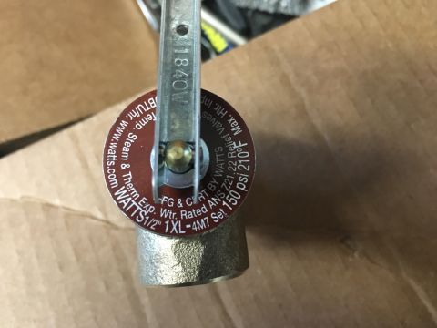 1995 Chevrolet P30 1 Ton - Step Van - Close-up of a water heater valve, identified by Watts branding and model number 1840W.