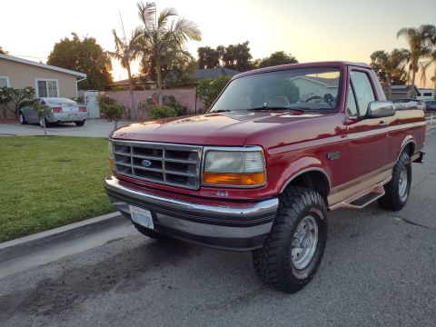 1994 Ford Bronco - This 1994 Ford Bronco features a two-tone paint scheme with tan accents.
