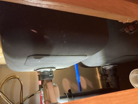 2015 Ford F-550 - Plumbing and underside of a double kitchen sink are visible in this close-up view.