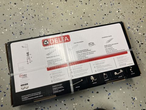 2015 Ford F-550 - The box displays installation instructions and required tools for a Delta faucet, along with product images.