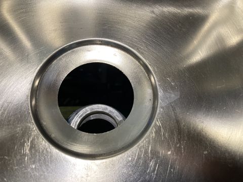 2015 Ford F-550 - Brushed metal surface with a drain opening and internal pipe detail.