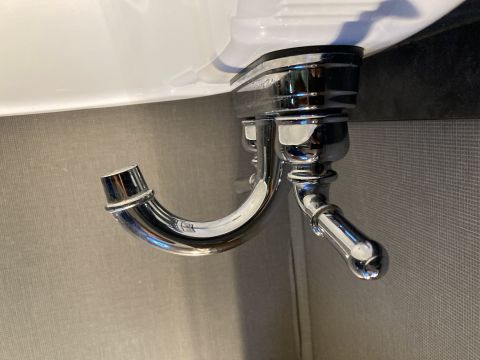 2015 Ford F-550 - Close-up view of a chrome faucet, likely from a bathroom or kitchen fixture.