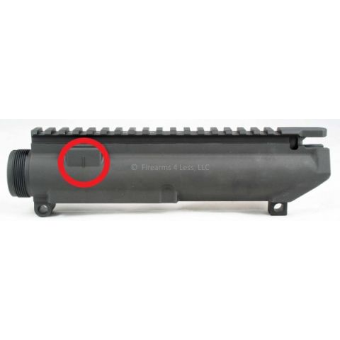 1995 Mercury Grand Marquis - A black gun receiver is shown with a red circle highlighting a small rectangular marking.