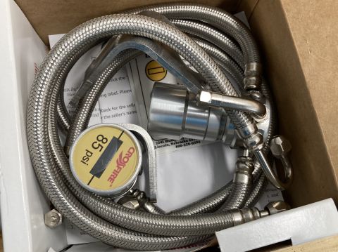 2015 Ford F-550 - This Crossfire tire pressure gauge and hose assembly is shown in its packaging, with the gauge reading 85 psi.