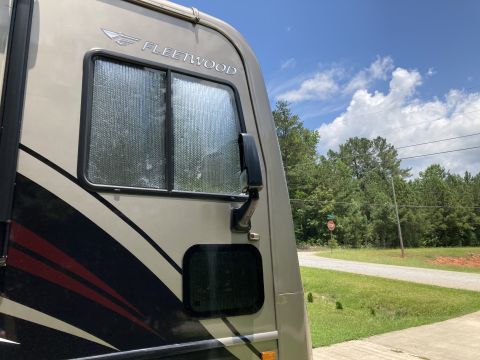 2015 Ford F-550 - The Fleetwood logo is visible on the side of this recreational vehicle.