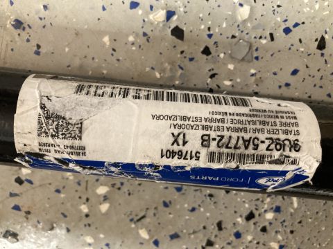 2015 Ford F-550 - A close-up of a Ford stabilizer bar with its part number and barcode visible on the label.