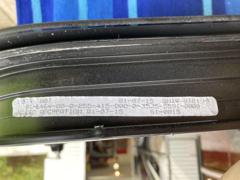2015 Ford F-550 - A close-up view of a label attached to a vehicle component, showing manufacturing or shipping information.