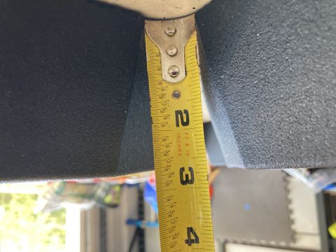 2015 Ford F-550 - Measuring the depth of a textured component with a tape measure.