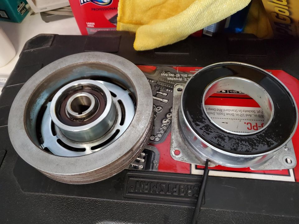 AC compressor clutch and pulley assembly, possibly for a car
